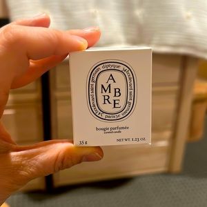 New unopened scented candle Diptyque AMBER